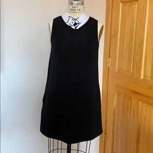 Cat collar shift dress.